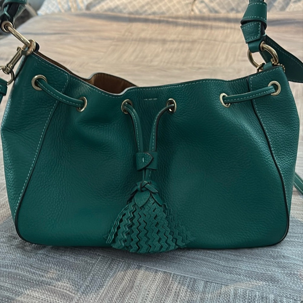 Coach Leather Handbag. Green with gold hardware and tassel.